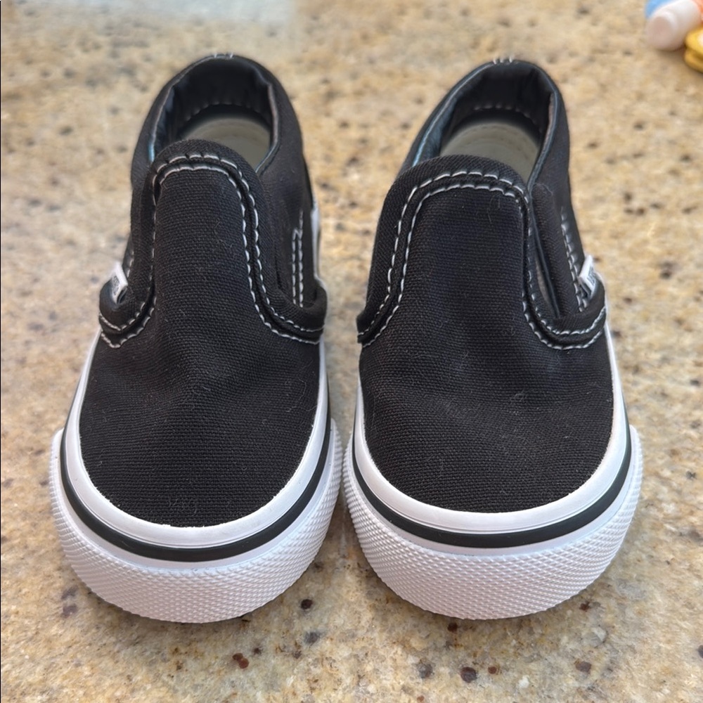 Vans Black and White Slip-On Sneakers Classic Canvas Design